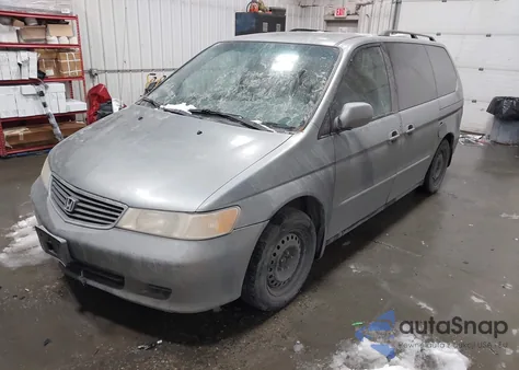 2001 Honda Odyssey Ex z USA, uszkodzony, nr VIN 2HKRL18601H513816